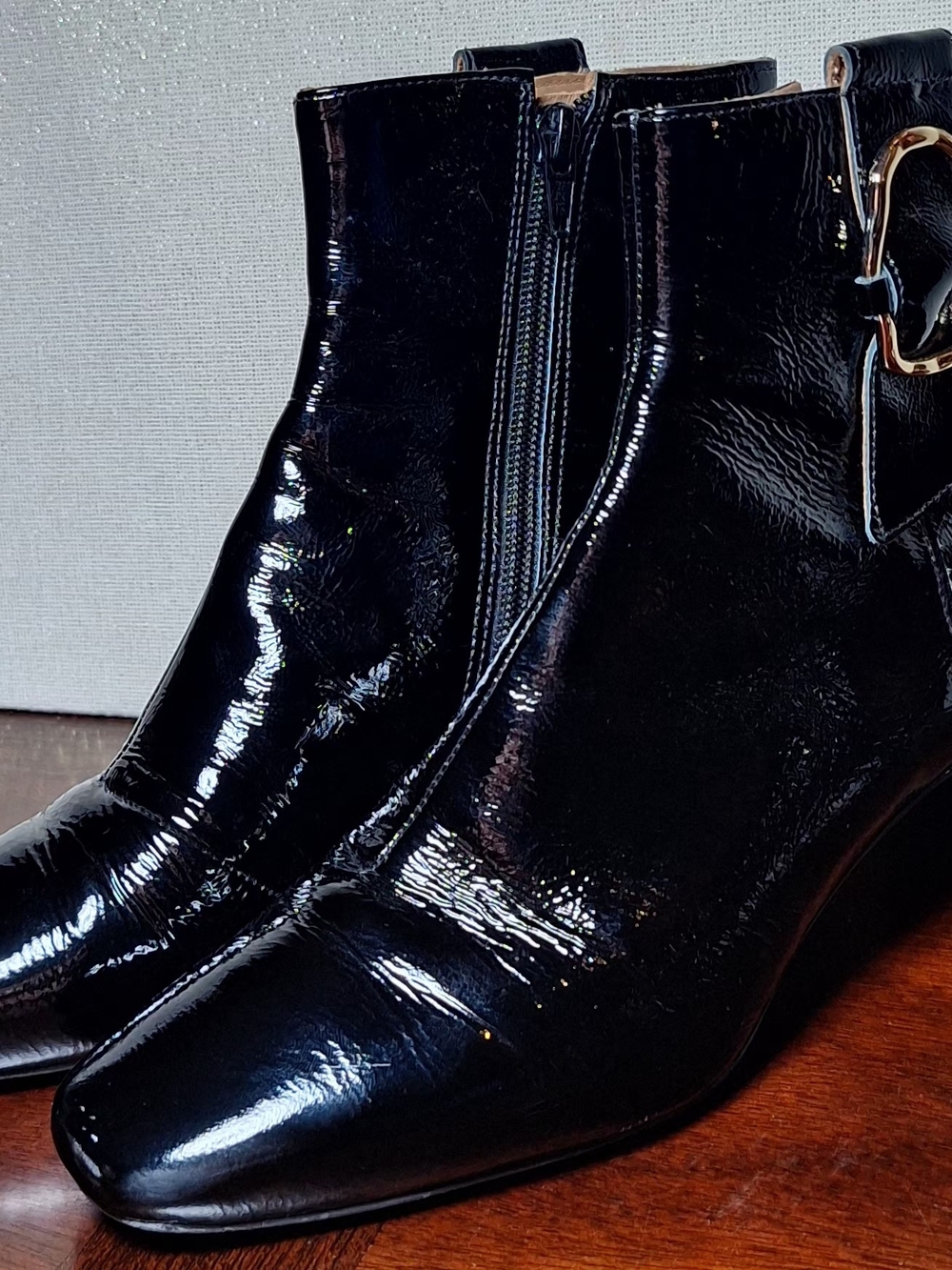 Sleek Black Patent Ankle Booties with Side Zip and Buckle Accent